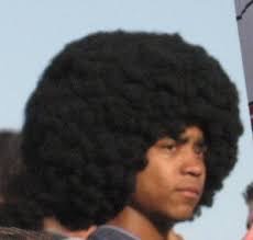A man with the afro hairstyle
