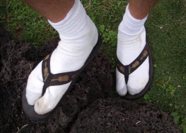 A dad wearing tube socks with sandals
