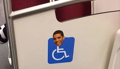 Drake's head on a handicap wheelchair sign