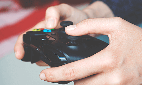 Gamer holding an Xbox controller
